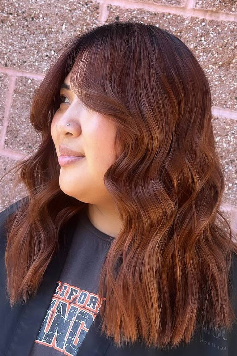 Warm Copper Waves with Soft Face-Framing Layers