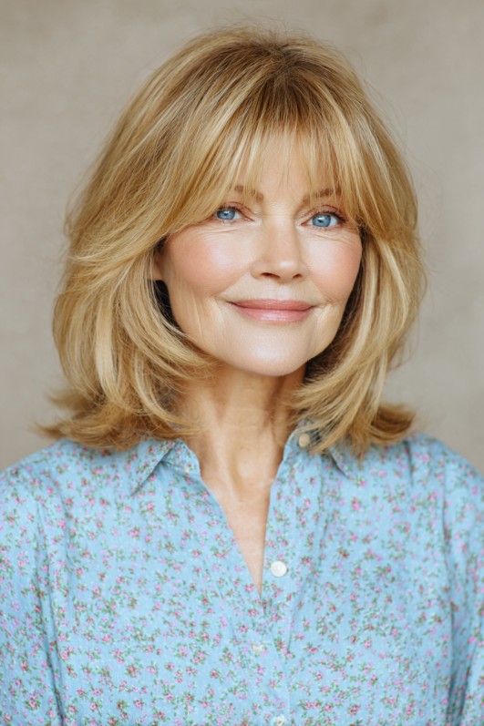 Softly Layered Shoulder-Length Cut with Face-Framing Bangs