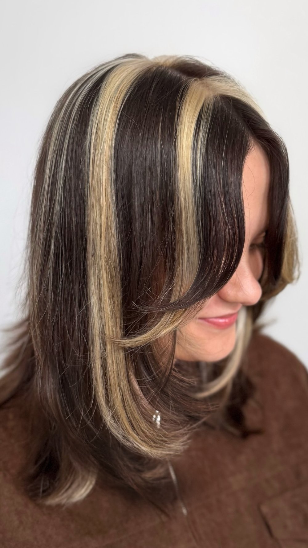 Chic Dark Brown Hair with Bold Light Blonde Chunky Highlights