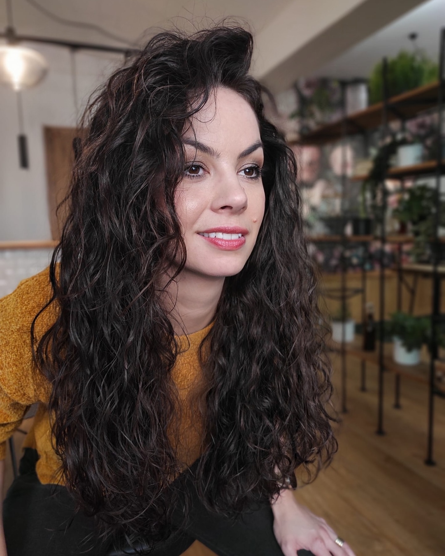 Dynamic Curly Cut with Emphasized Volume