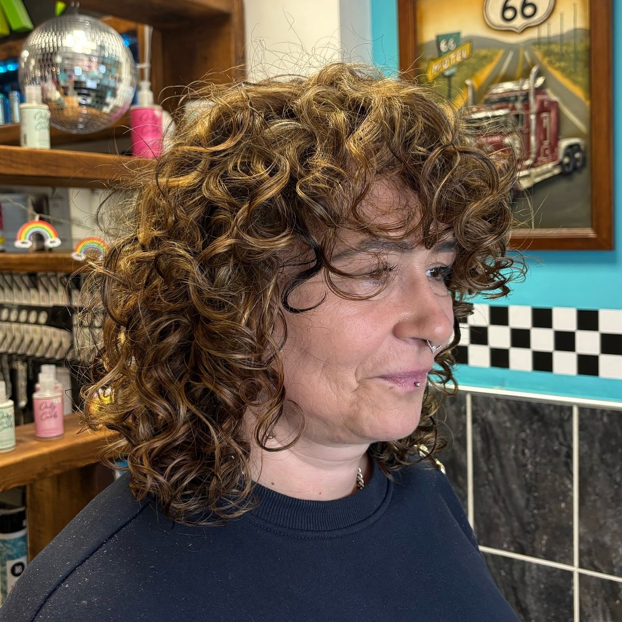 Soft Curly Shoulder-Length Cut with Defined Texture