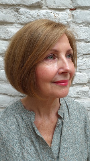 Softly Layered Side-Parted Bob with Subtle Volume