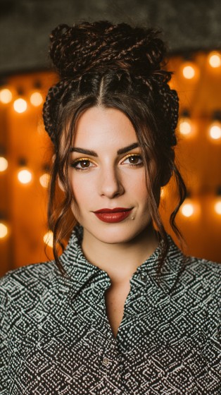 Intricate Braided Top Knot with Loose Waves