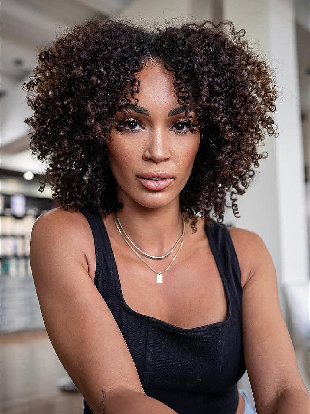 Defined Dark Brown Curly Bob with Volume