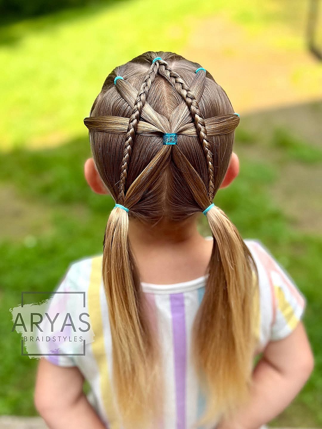 Intricate Braided Pigtails with Accent Braid Design