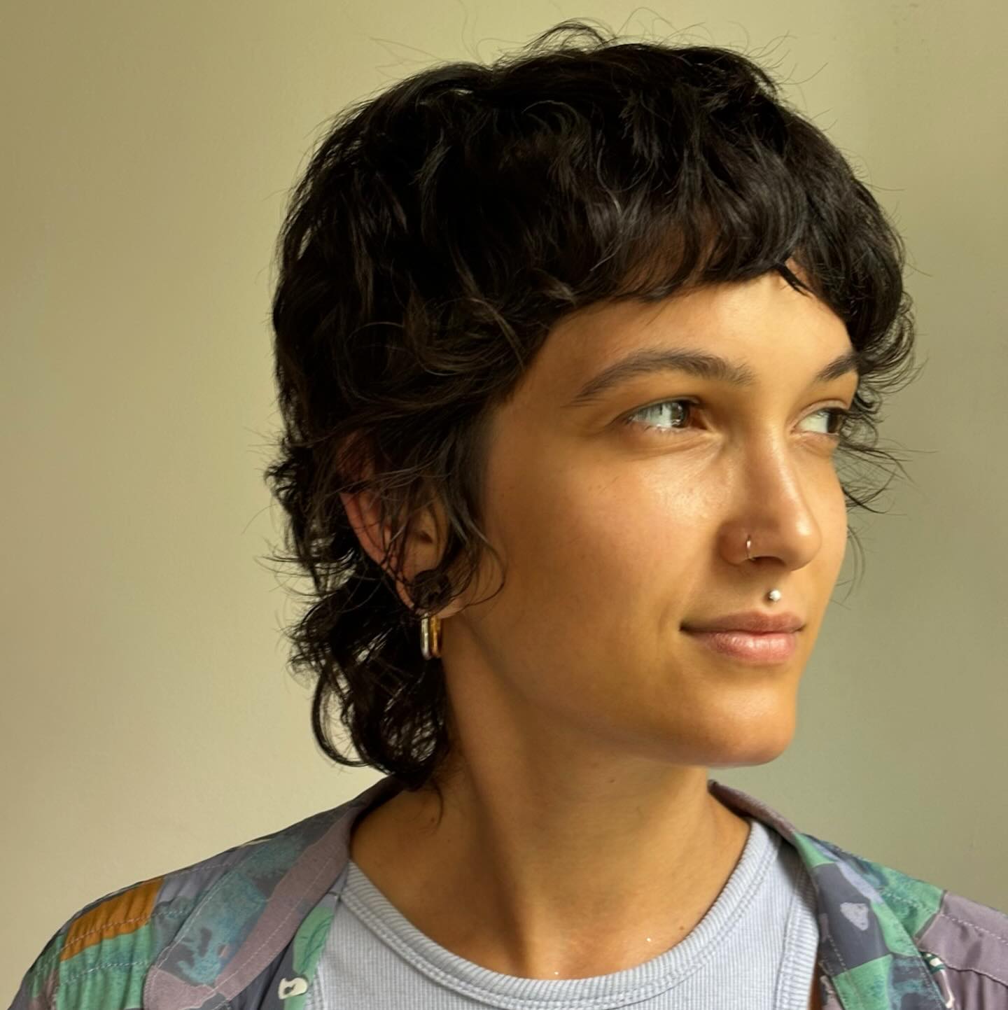 Textured Curly Pixie with Soft Bangs