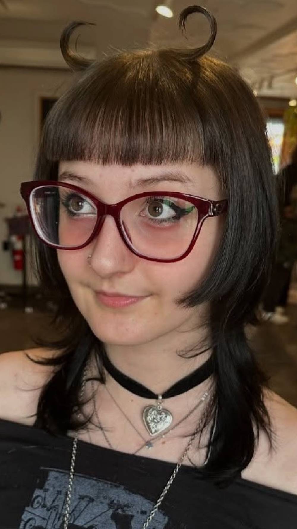 Quirky Hime Cut with Playful Bangs and Twisted Ends