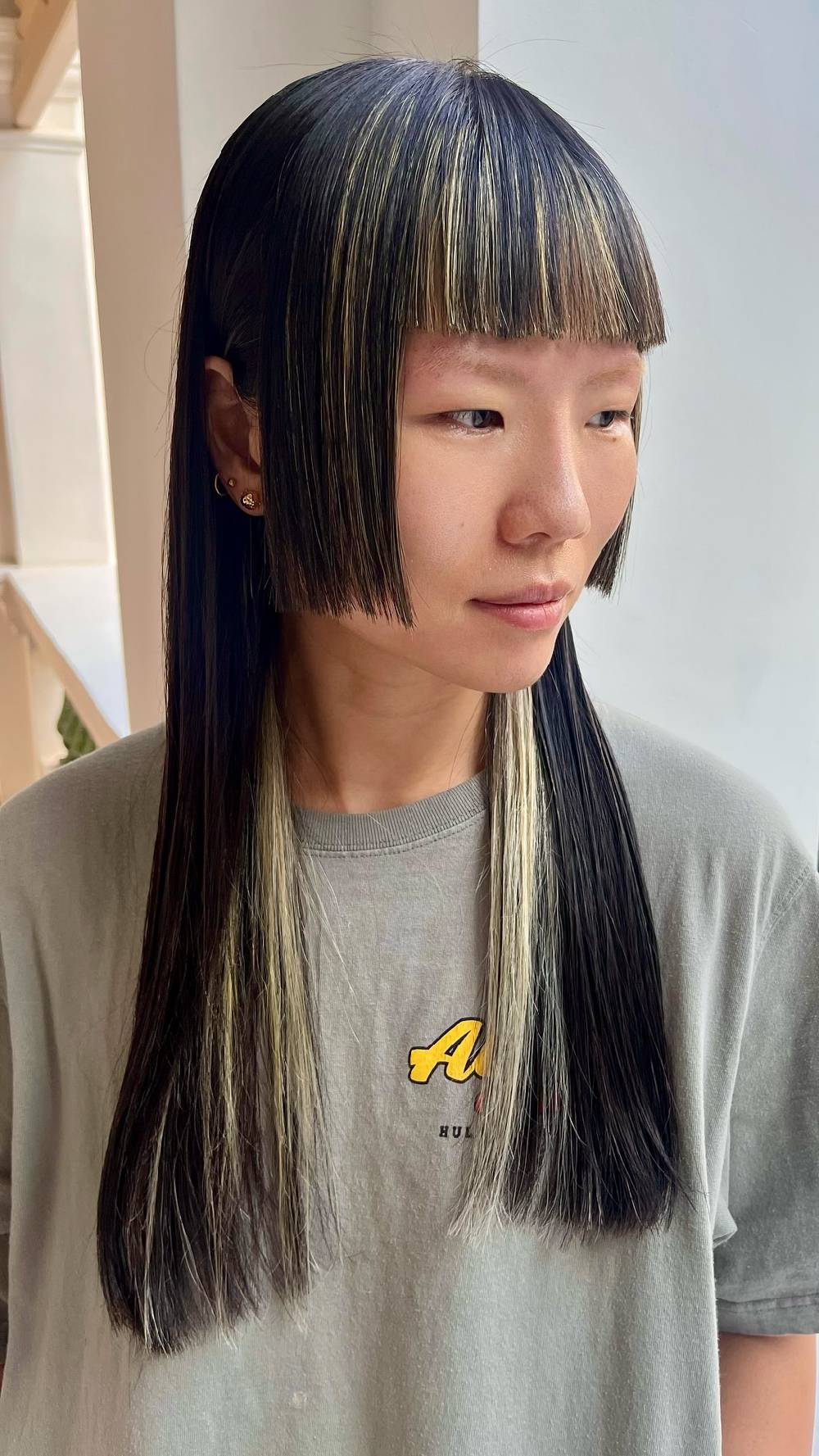 Striking Hime Cut with Bold Face-Framing Highlights