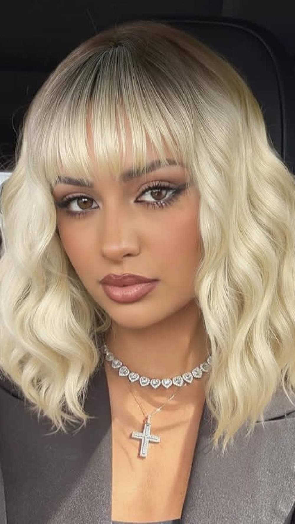 Chic Wavy Bob with Bold Straight Bangs