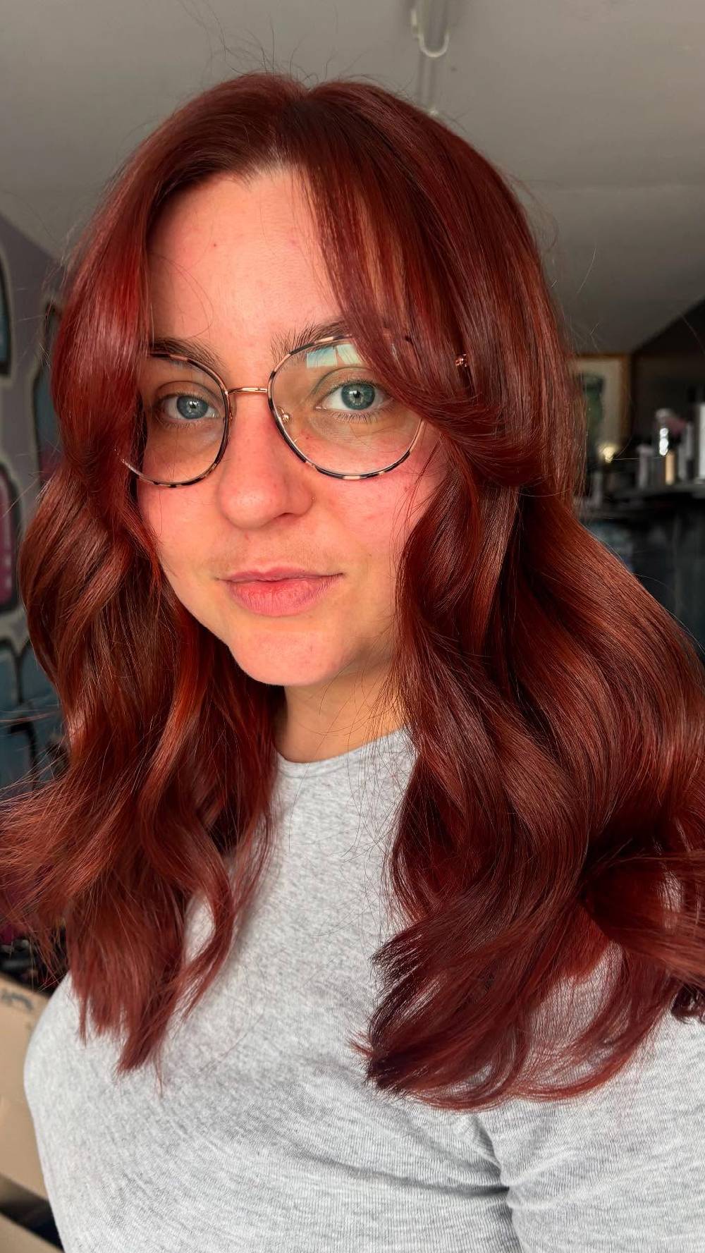 Rich Auburn Waves with Face-Framing Bangs