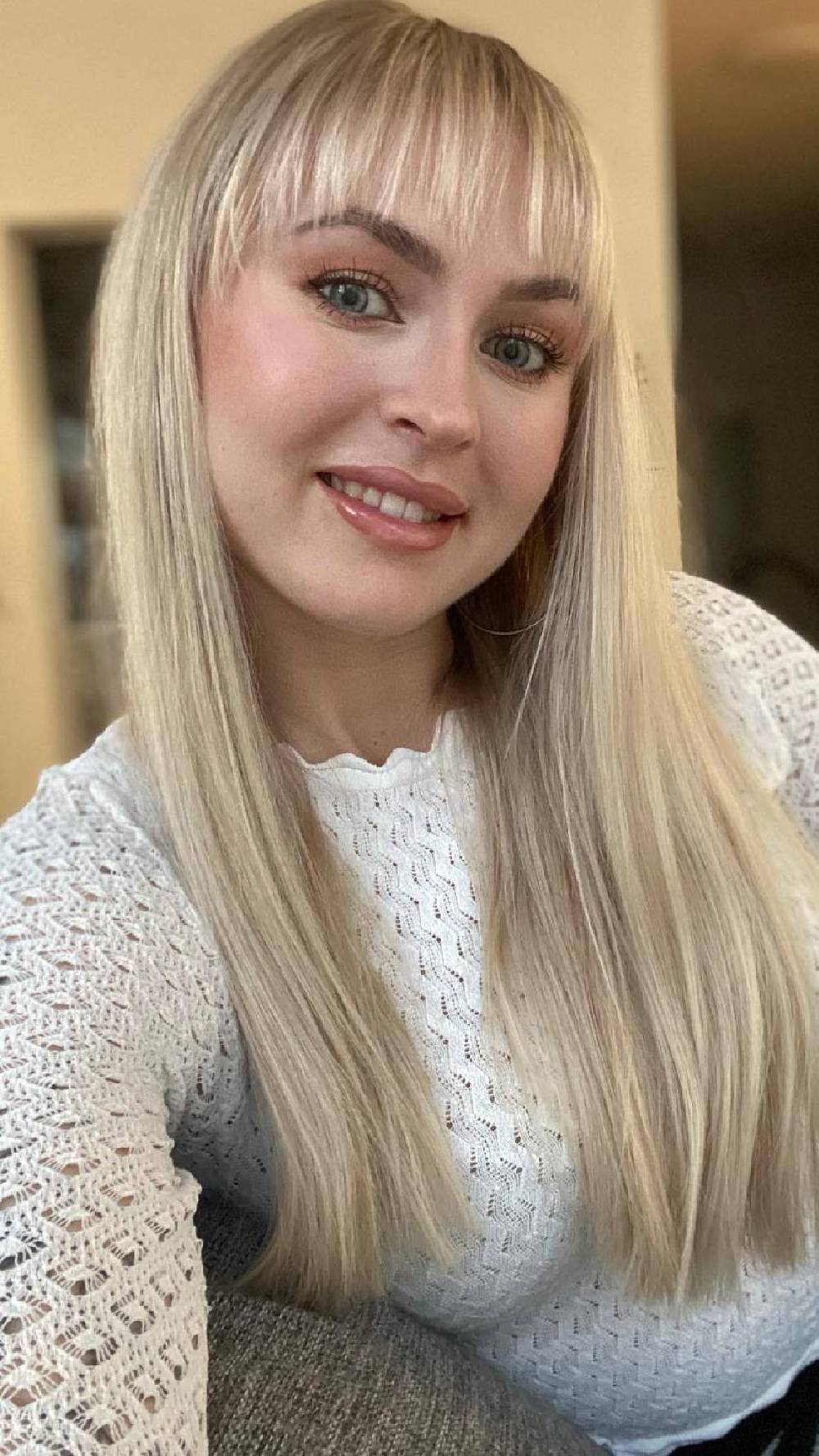 Stylish Blunt Bangs with Sleek Long Layers