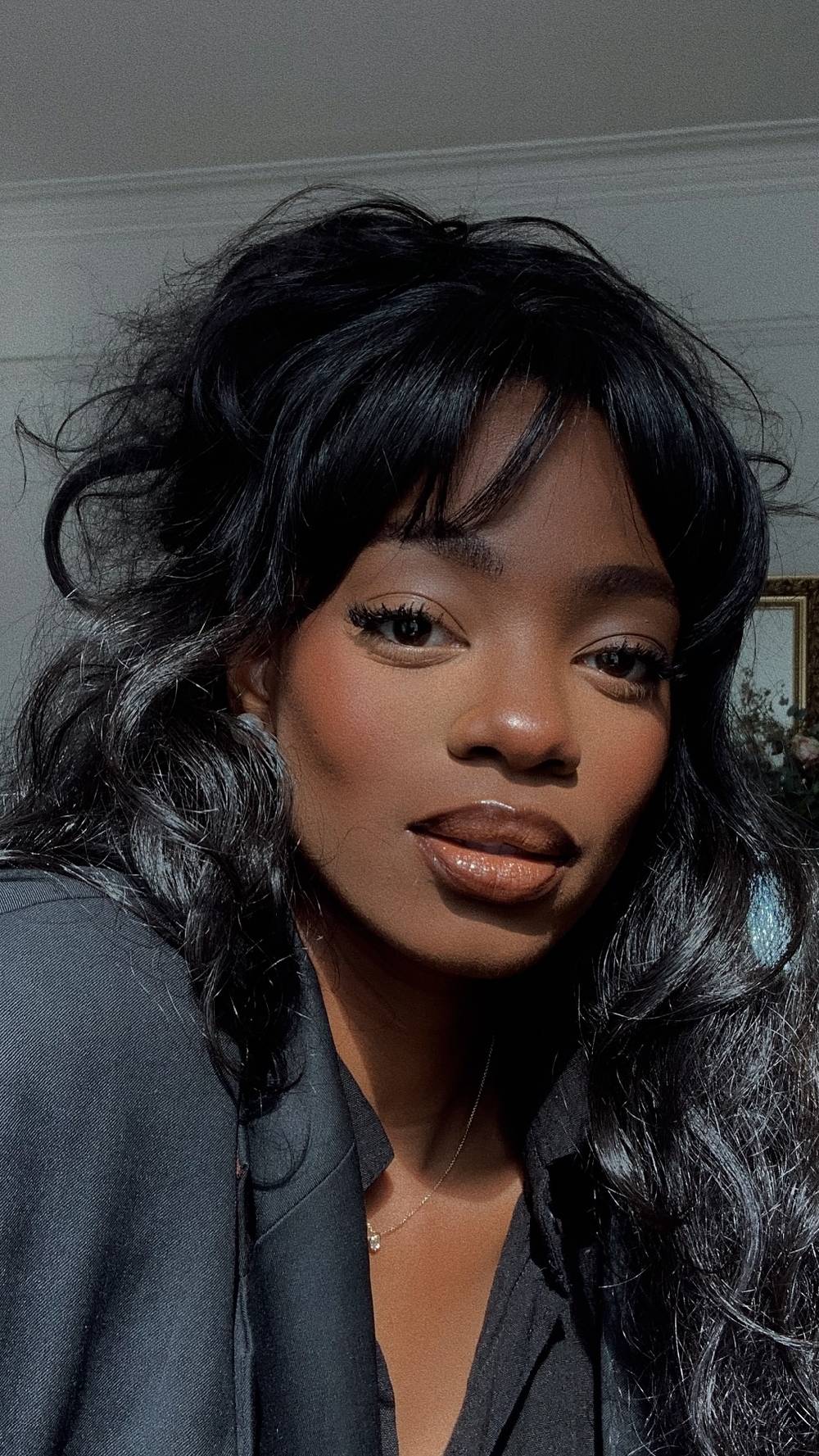 Textured Layered Haircut with Soft Curtain Bangs