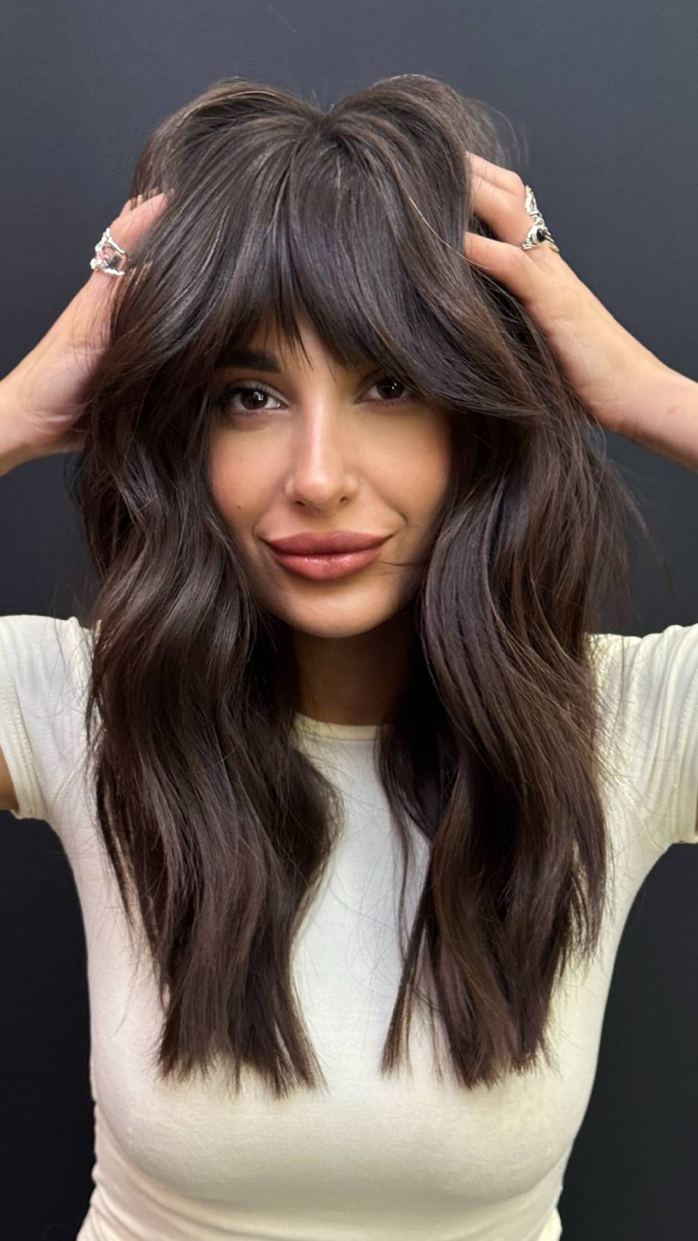 Textured Long Waves with Bold Curtain Bangs