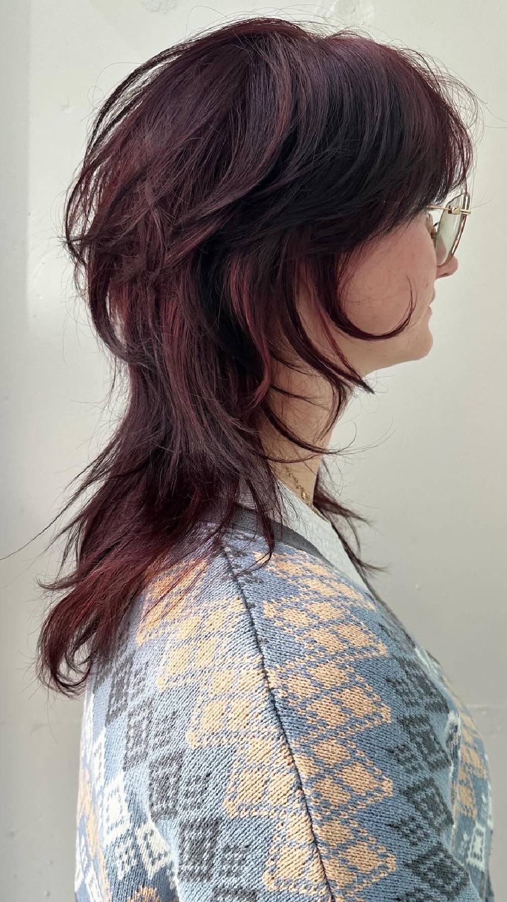 Bold Layered Wolfcut with Rich Burgundy Tones