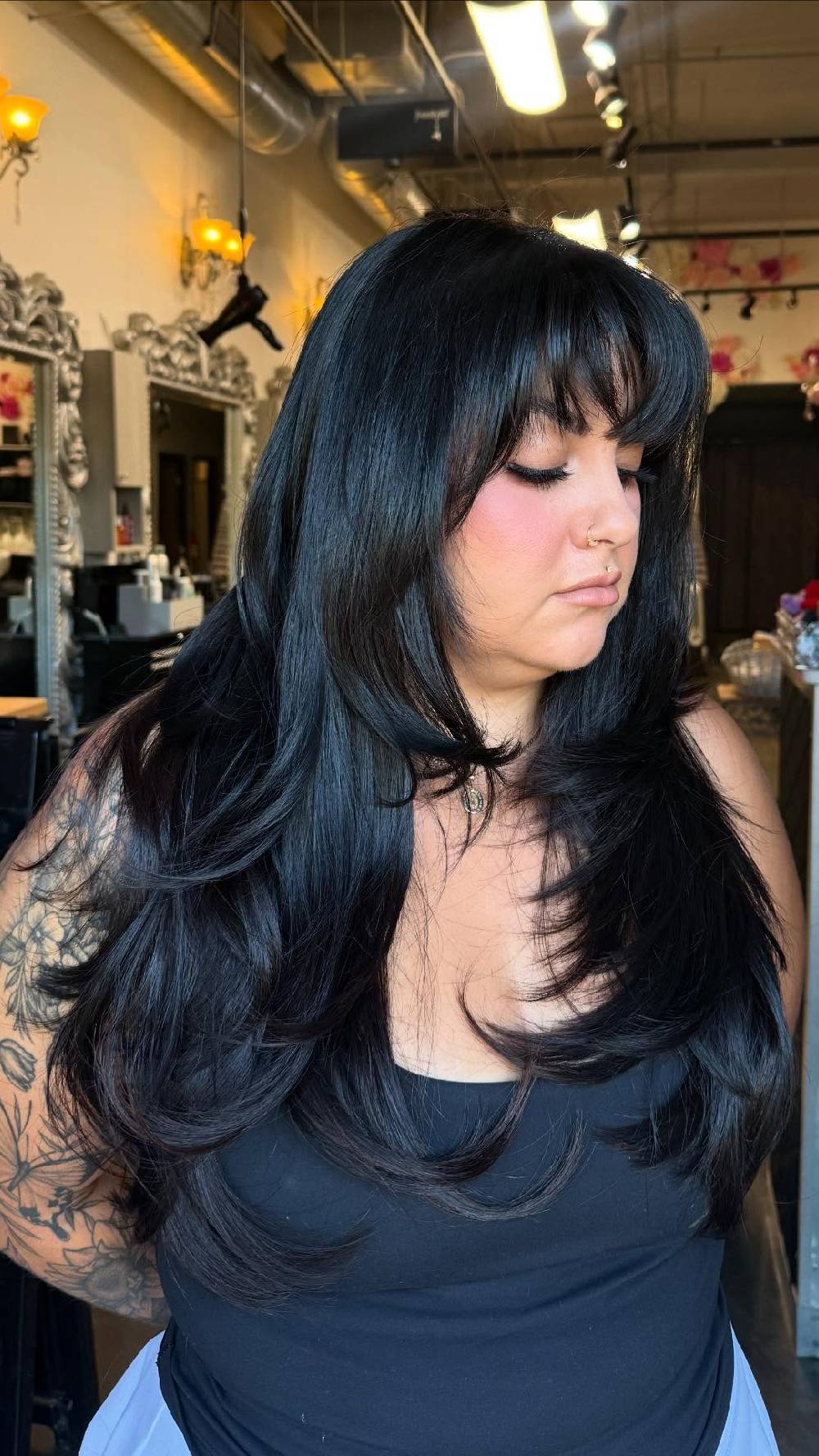 Chic Long Layers with Face-Framing Bangs