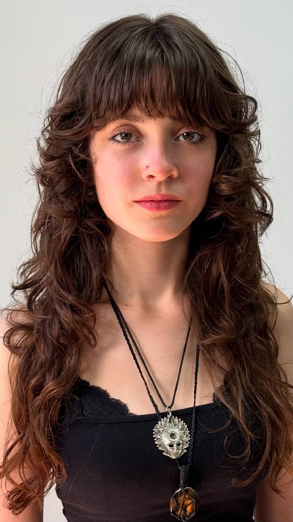 Dynamic Curly Wolfcut with Face-Framing Layers