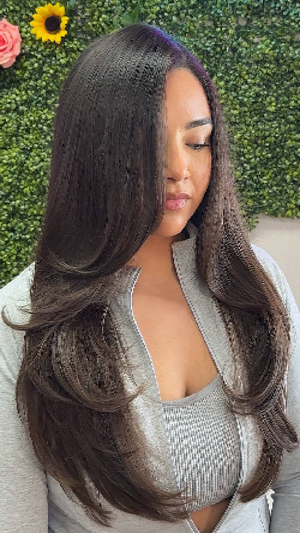 Sleek Long Layers with Subtle Face-Enhancing Movement