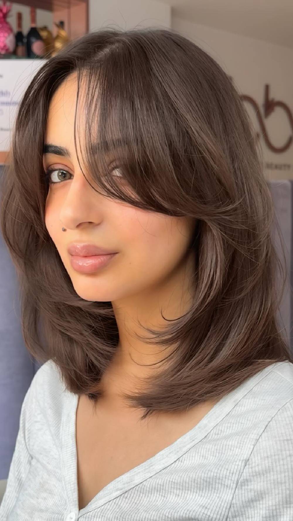 Softly Layered Medium-Length Cut with Face-Framing Highlights