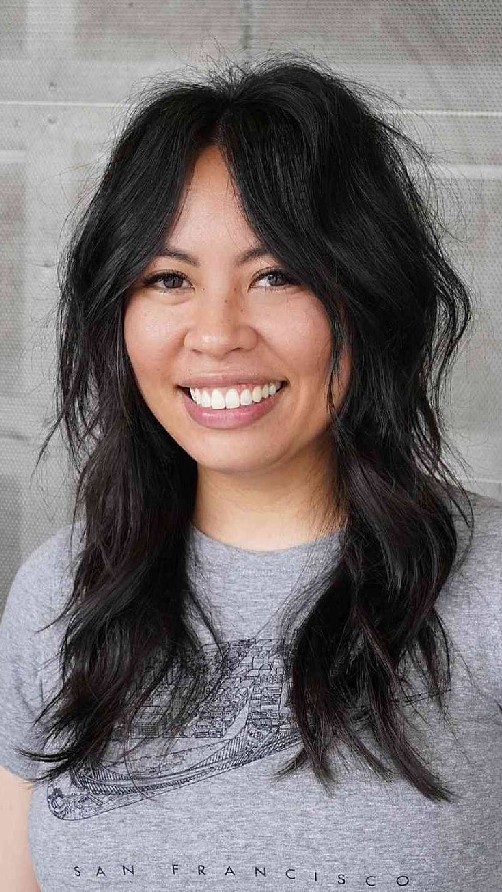 Textured Black Wolfcut with Soft Waves