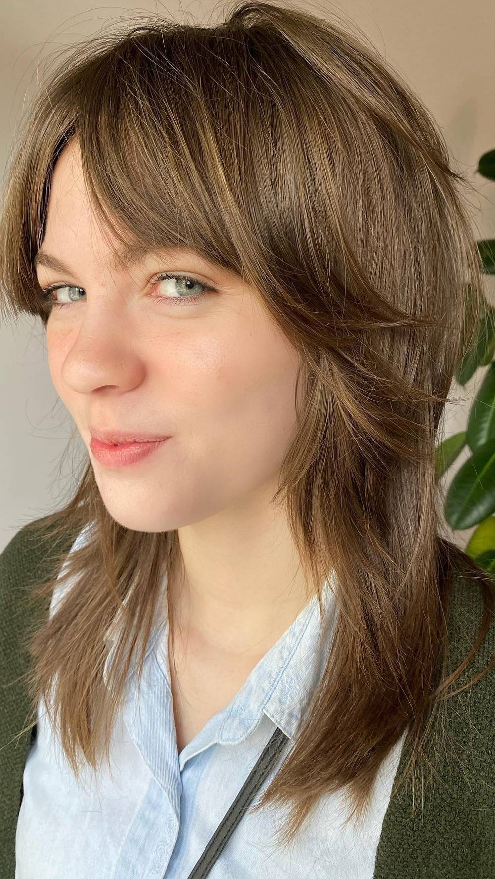 Textured Light Brown Wolfcut with Soft Curtain Bangs