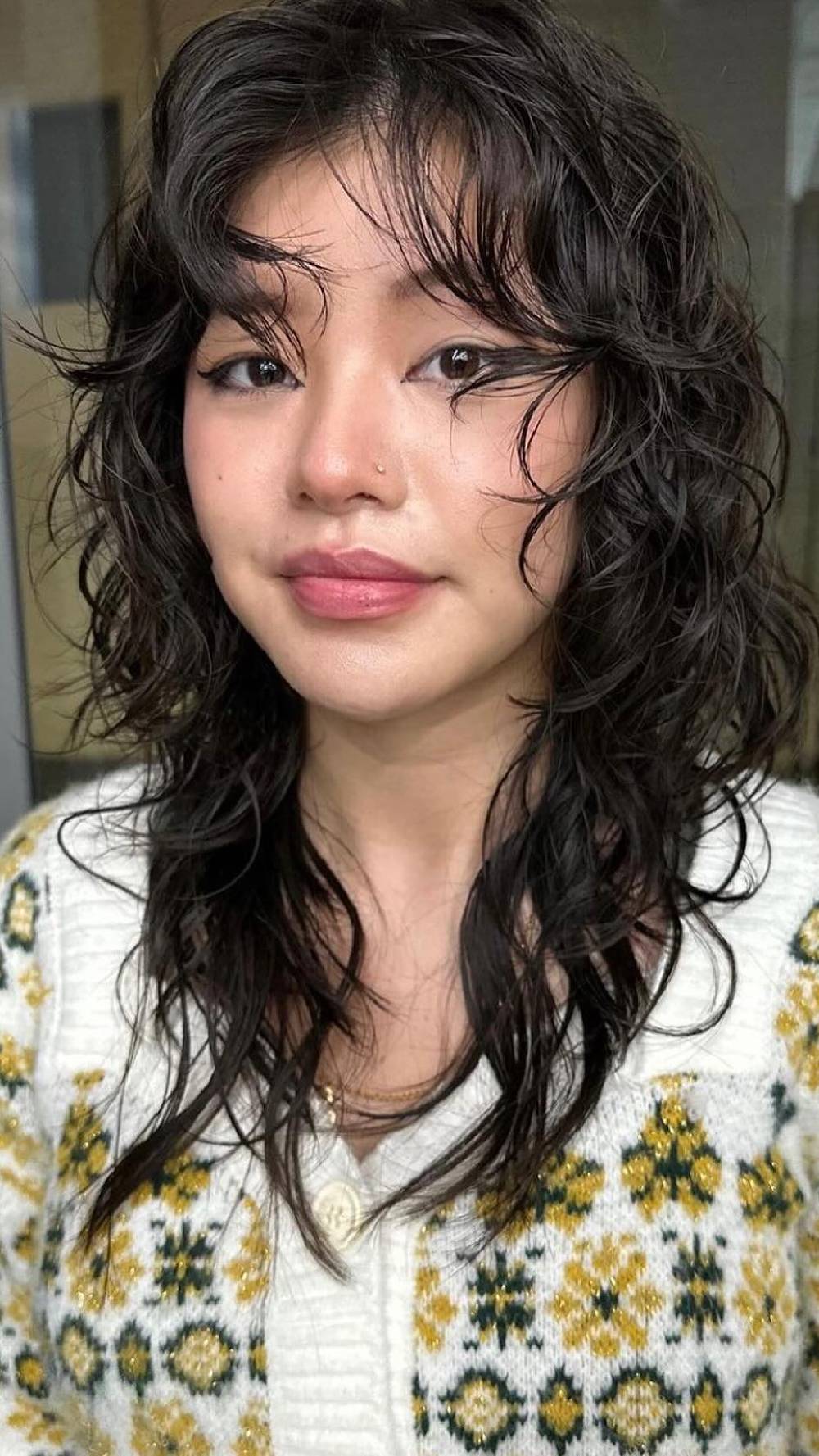 Textured Wolfcut with Defined Curls and Face-Framing Layers