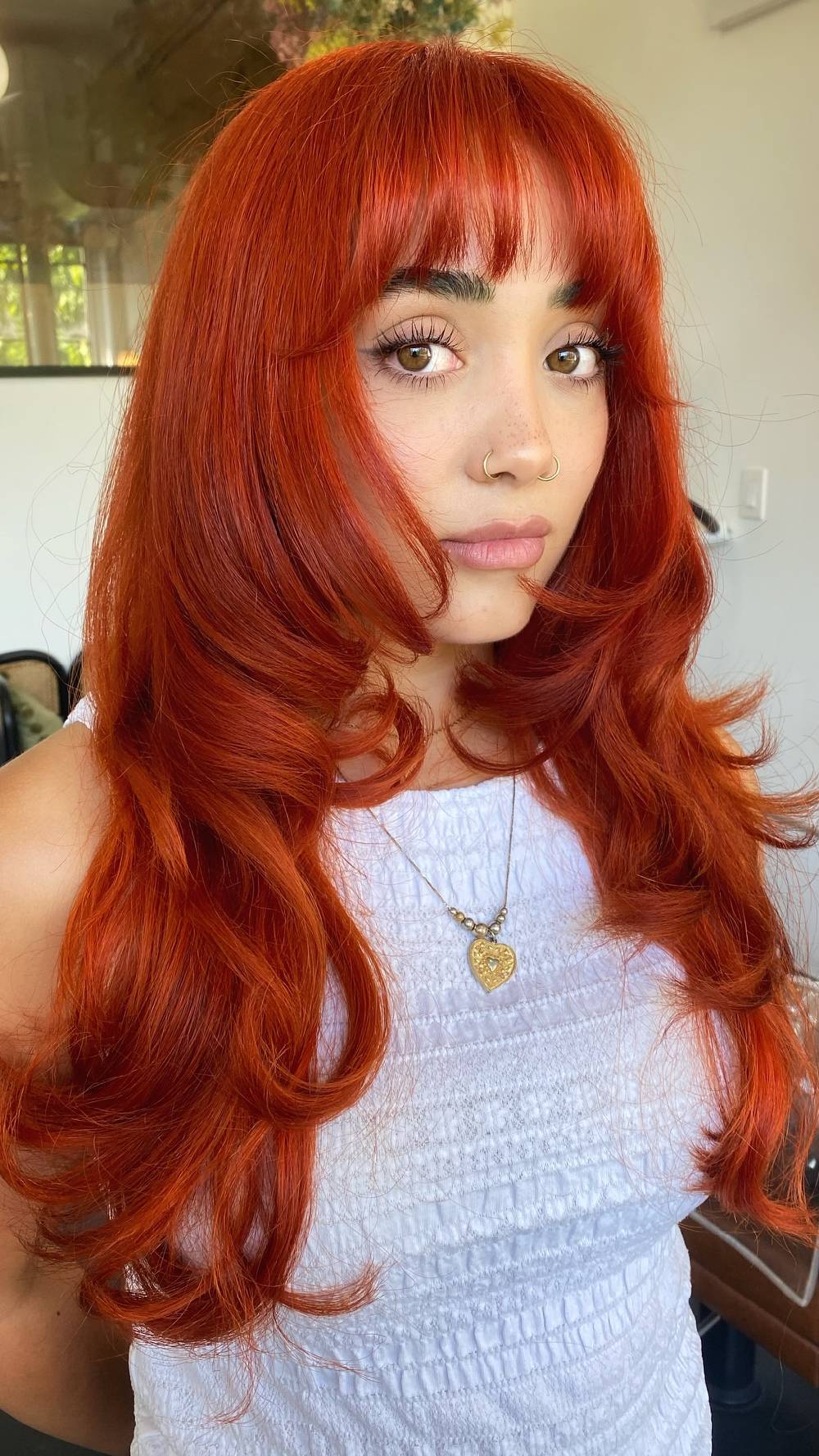 Vibrant Long Layers with Soft Face-Framing Bangs