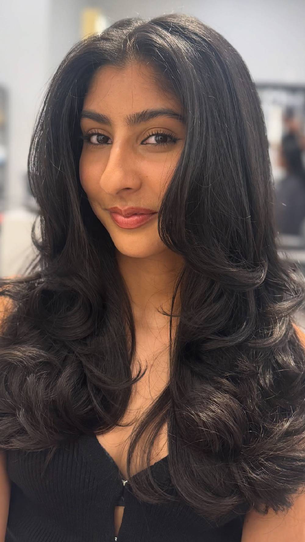 Voluminous Long Layers with Soft Face-Framing Curls