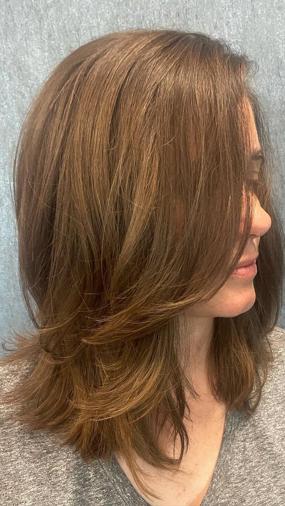 Effortlessly Layered Mid-Length Cut with Subtle Dimension