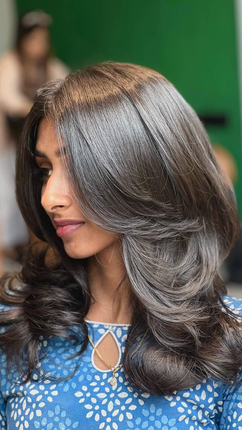 Elegant Softly Layered Mid-Length Hair with Glossy Finish