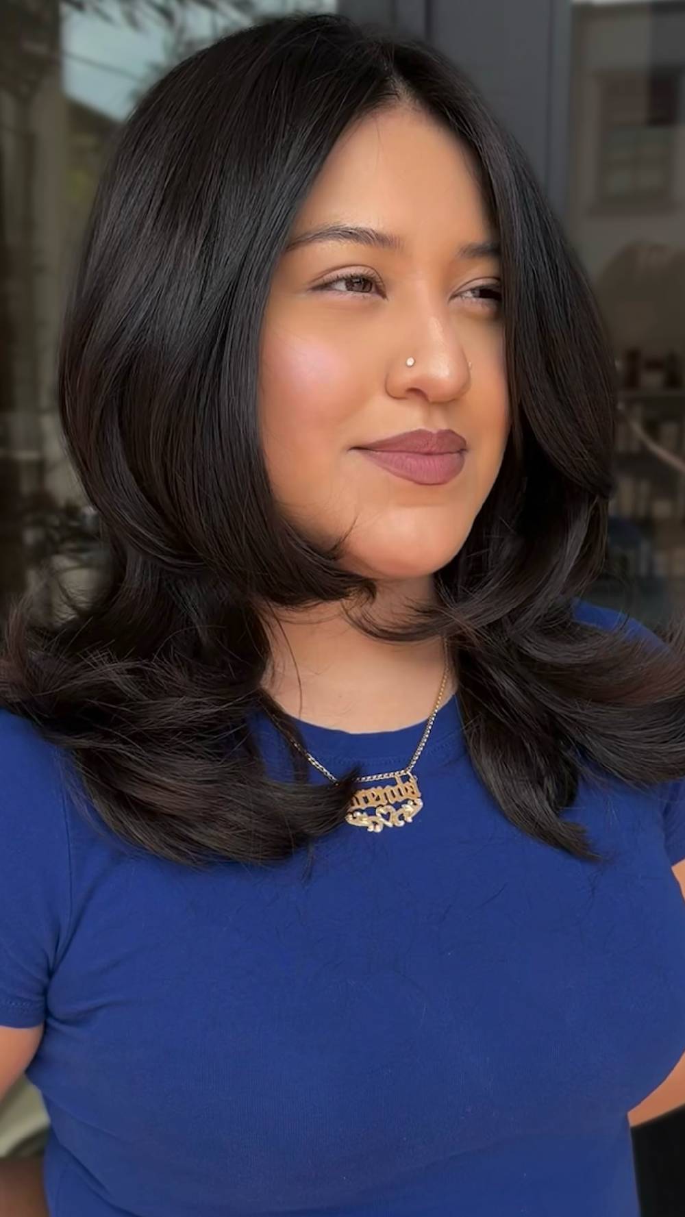 Glossy Mid-Length Layered Cut with Soft Volume