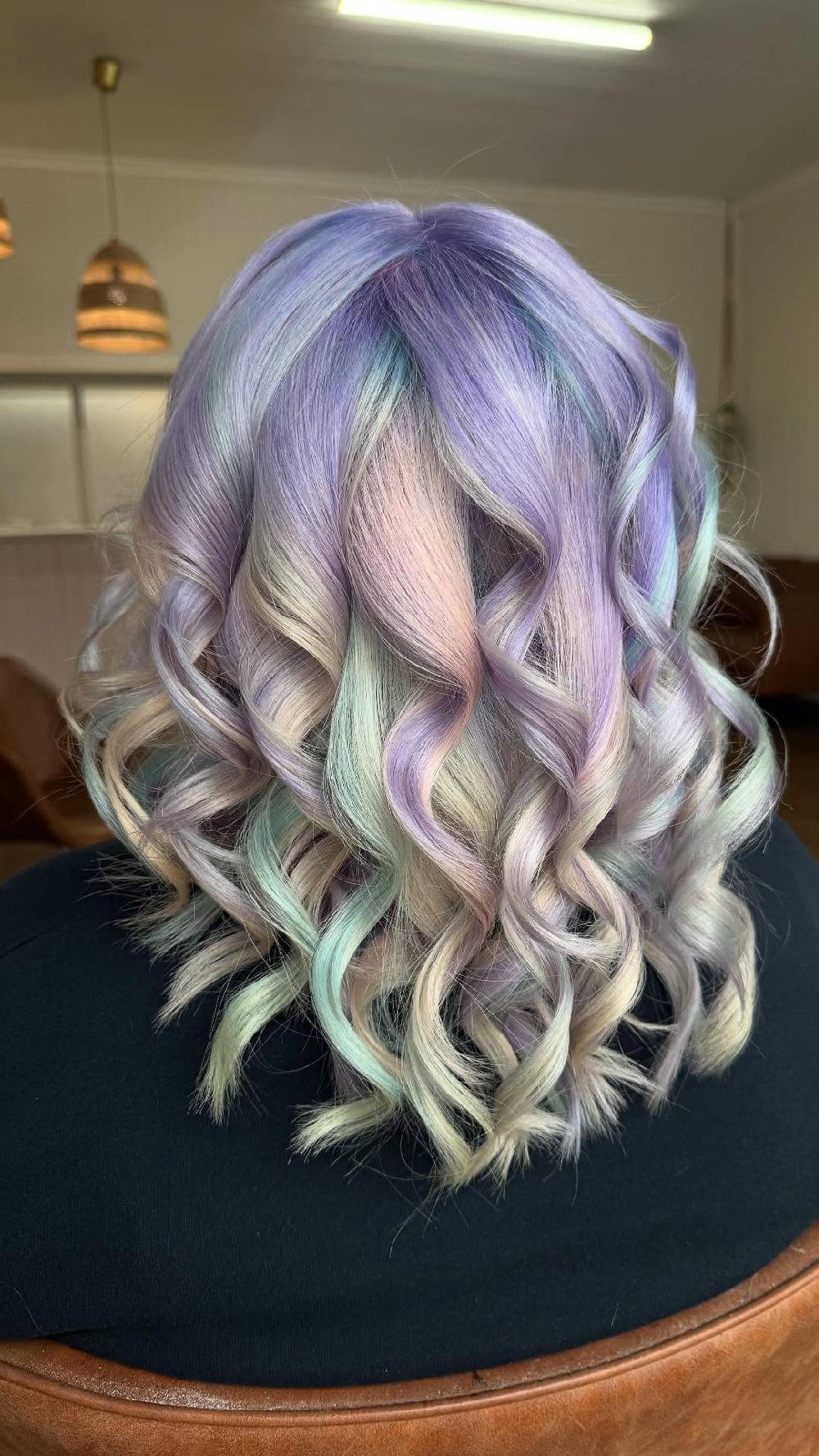 Soft Pastel Curly Mid-Length Hairstyle