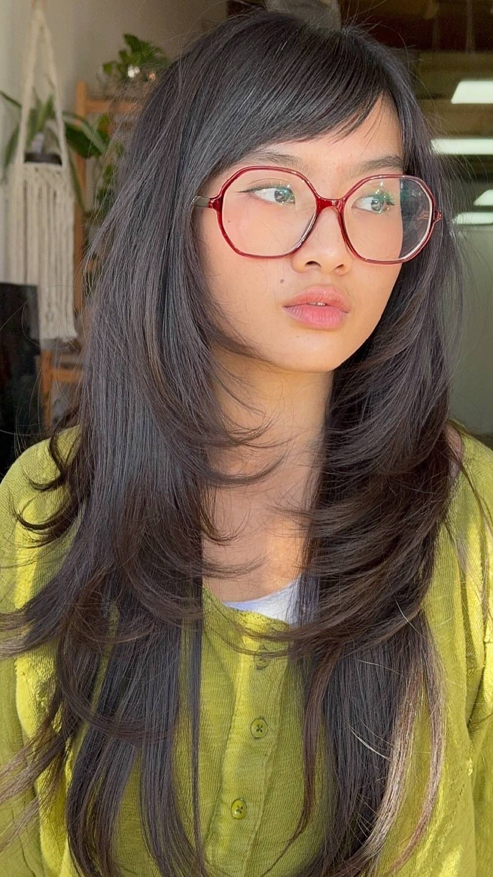 Long Layered Cut with Soft Face-Framing Bangs