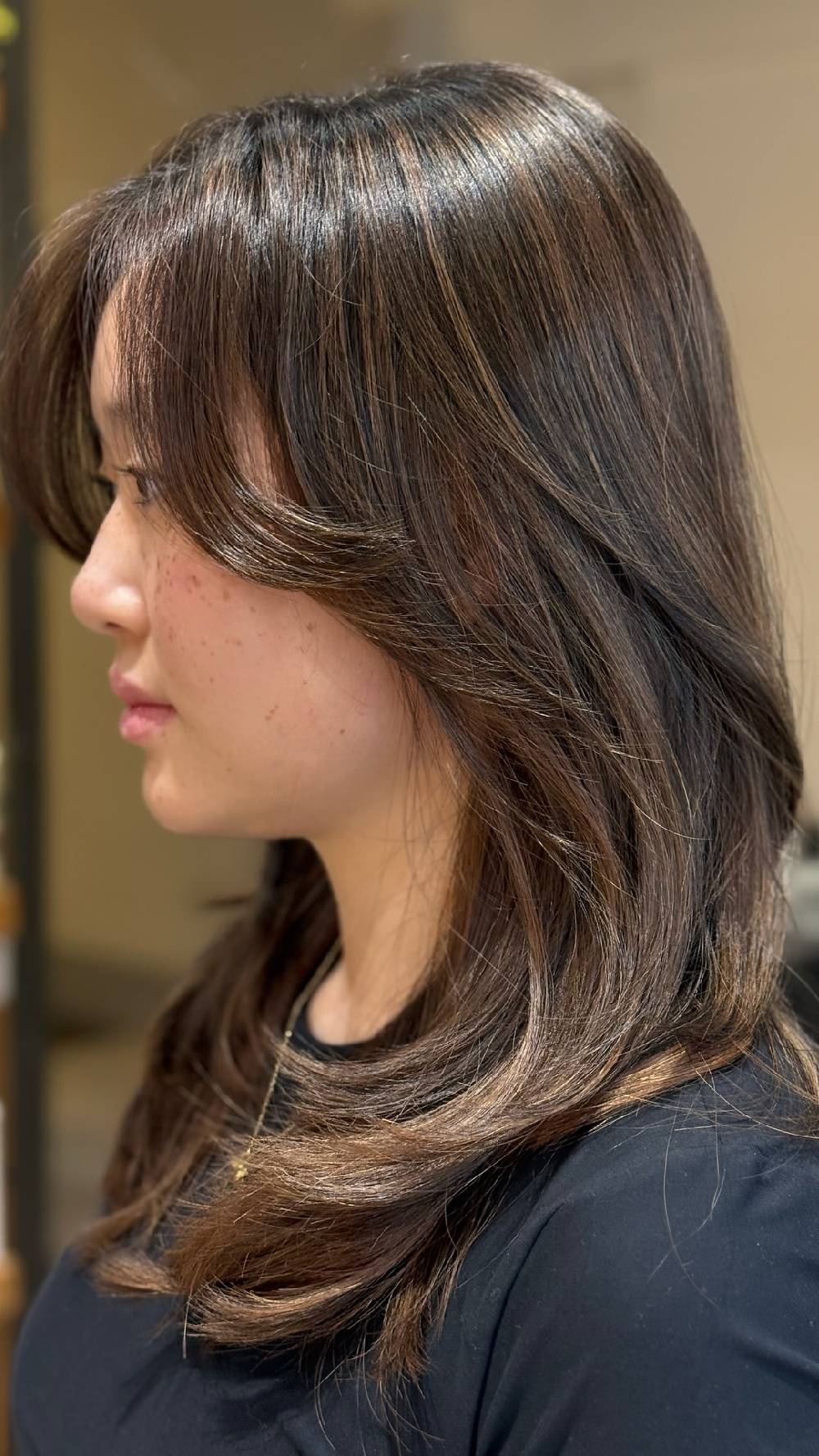 Sleek Mid-Length Cut with Subtle Face-Frame Layers