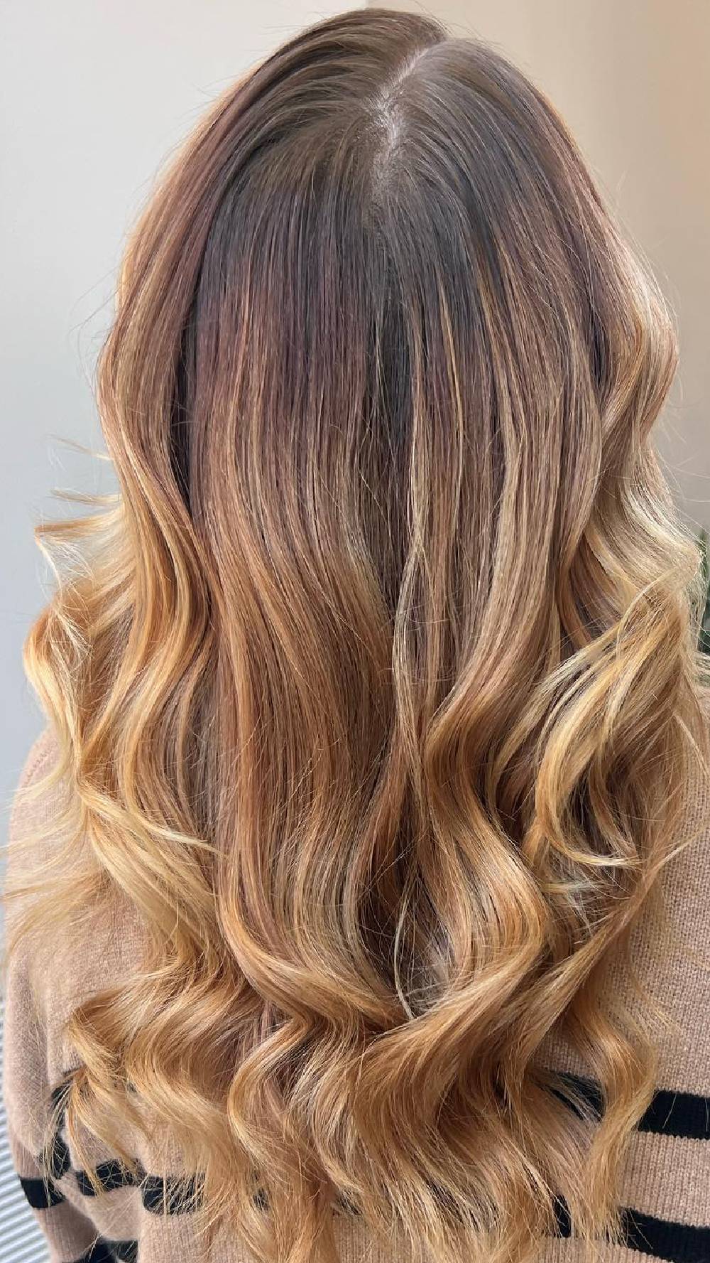 Soft Beachy Waves with Golden Highlights