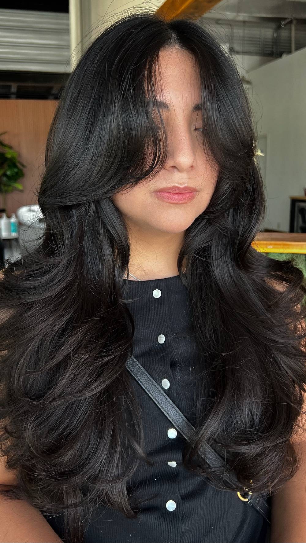 Voluminous Layered Cut with Face-Framing Bangs