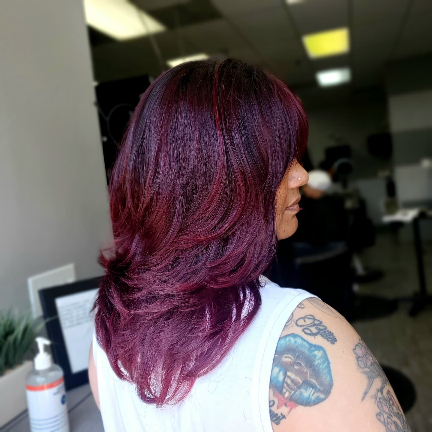 Bold Black Cherry Balayage with Layered Volume