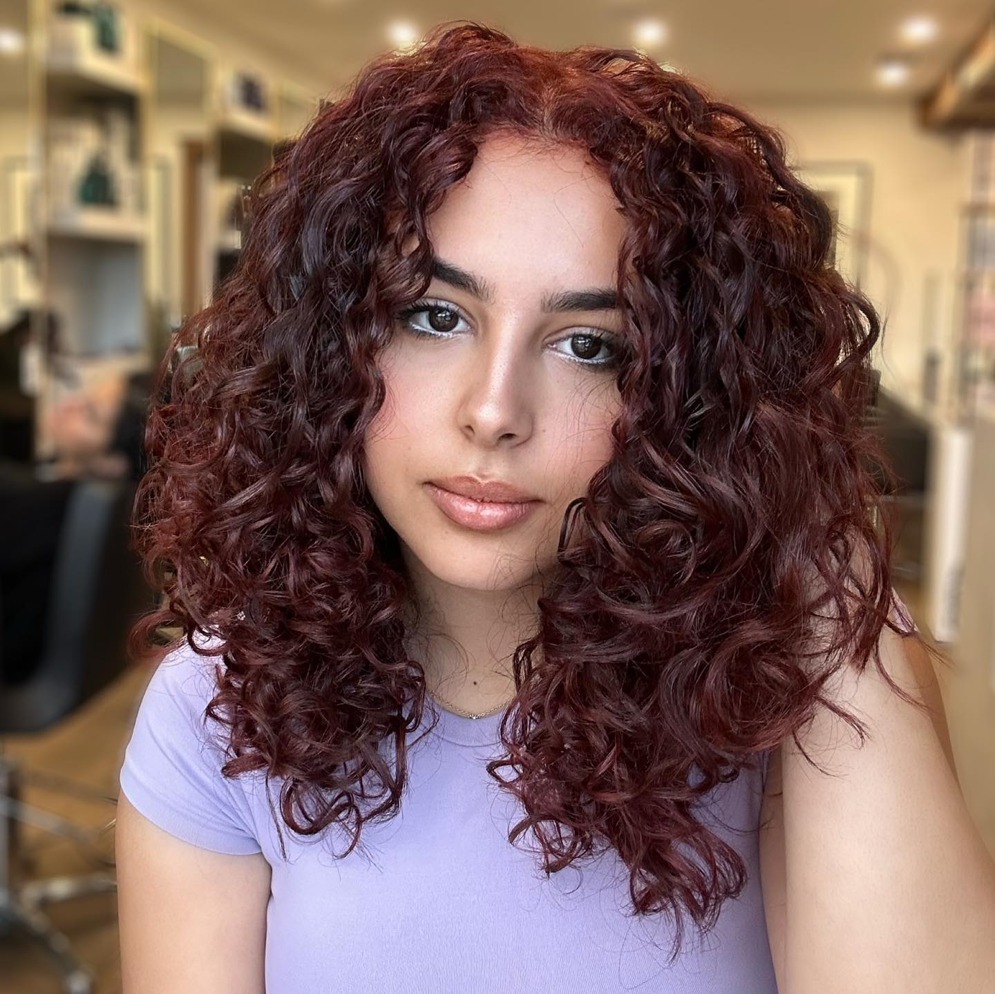Chic Curly Black Cherry Balayage with Defined Curls