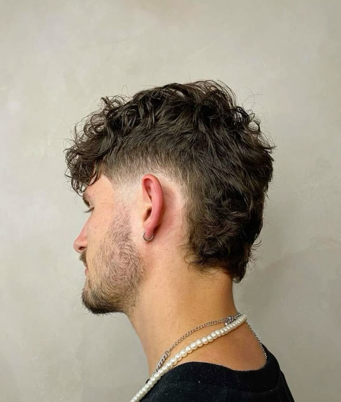 Chic Curly Textured Mullet with Tapered Sides