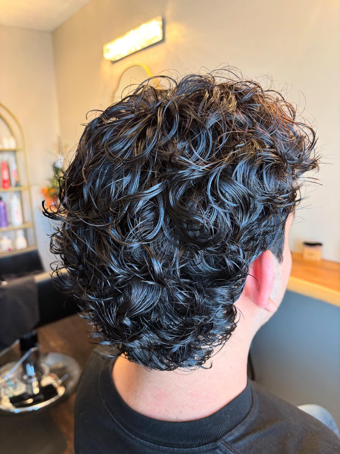 Defined Curly Back with Layered Volume