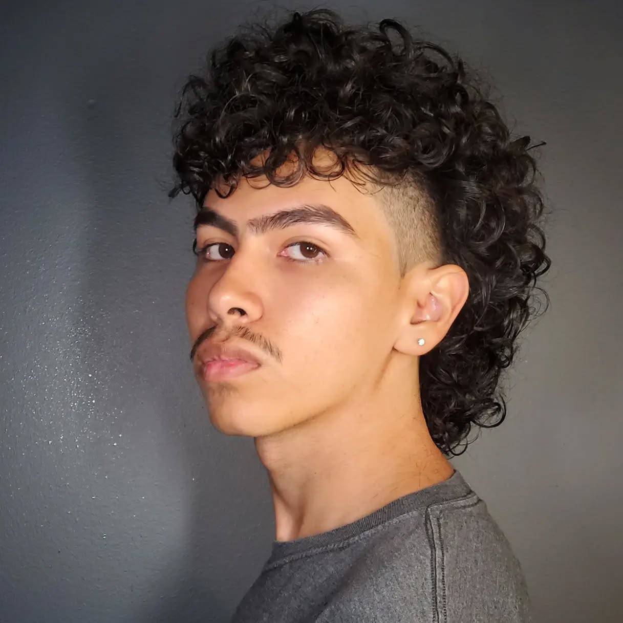 Modern Curly Mullet with Tapered Sides