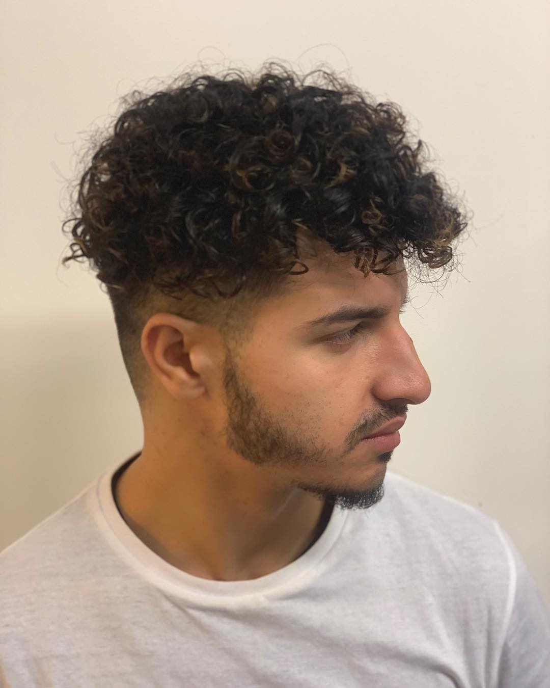 Modern Curly Top with Faded Sides