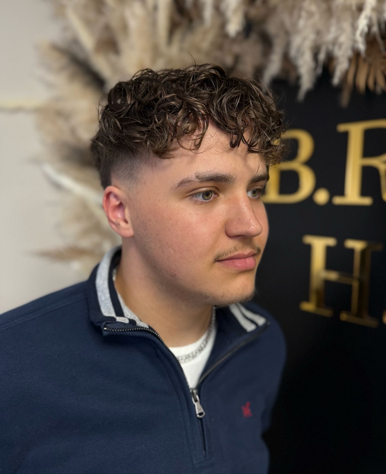 Modern Curly Top with Tapered Sides