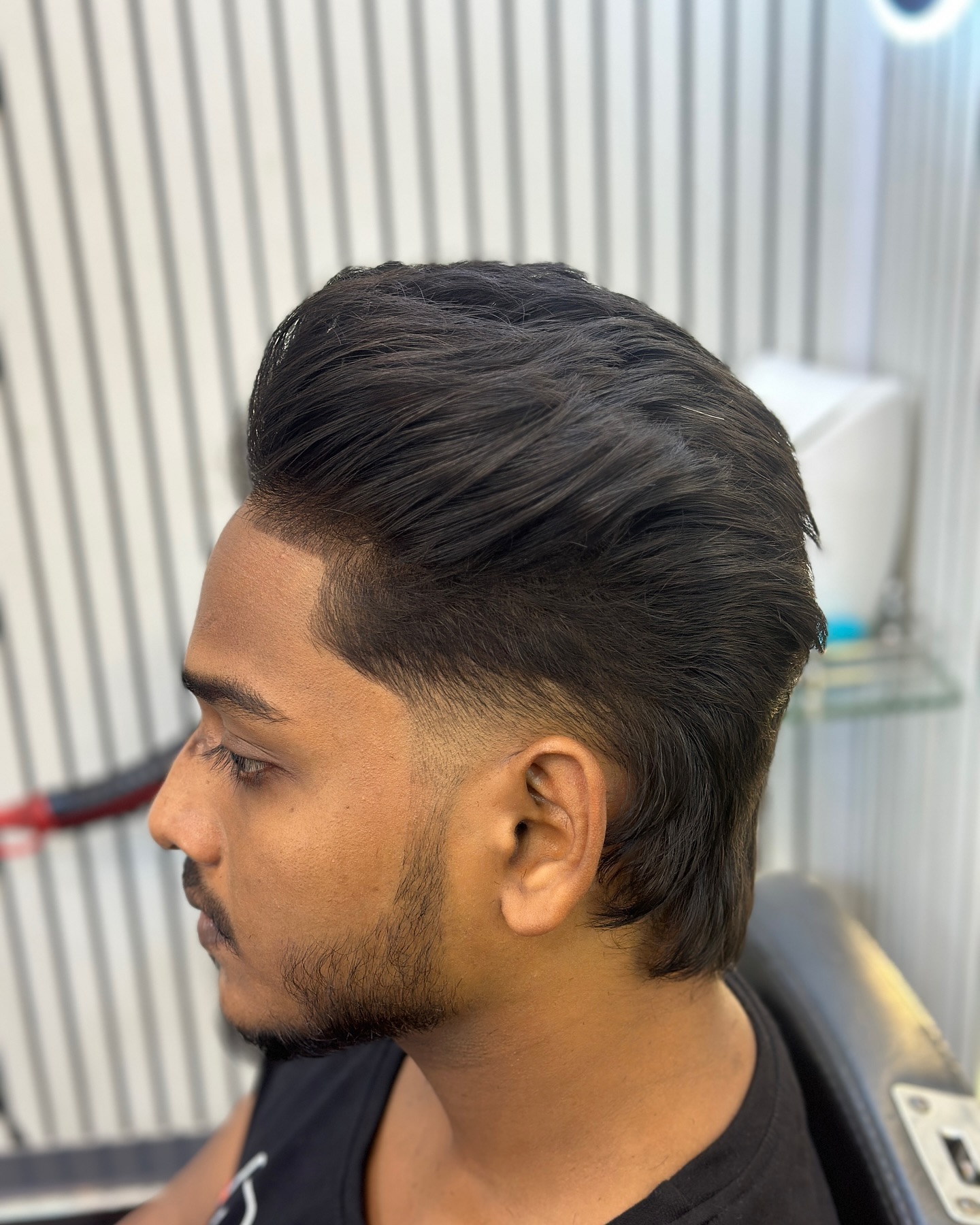Modern Textured Pompadour with Tapered Sides
