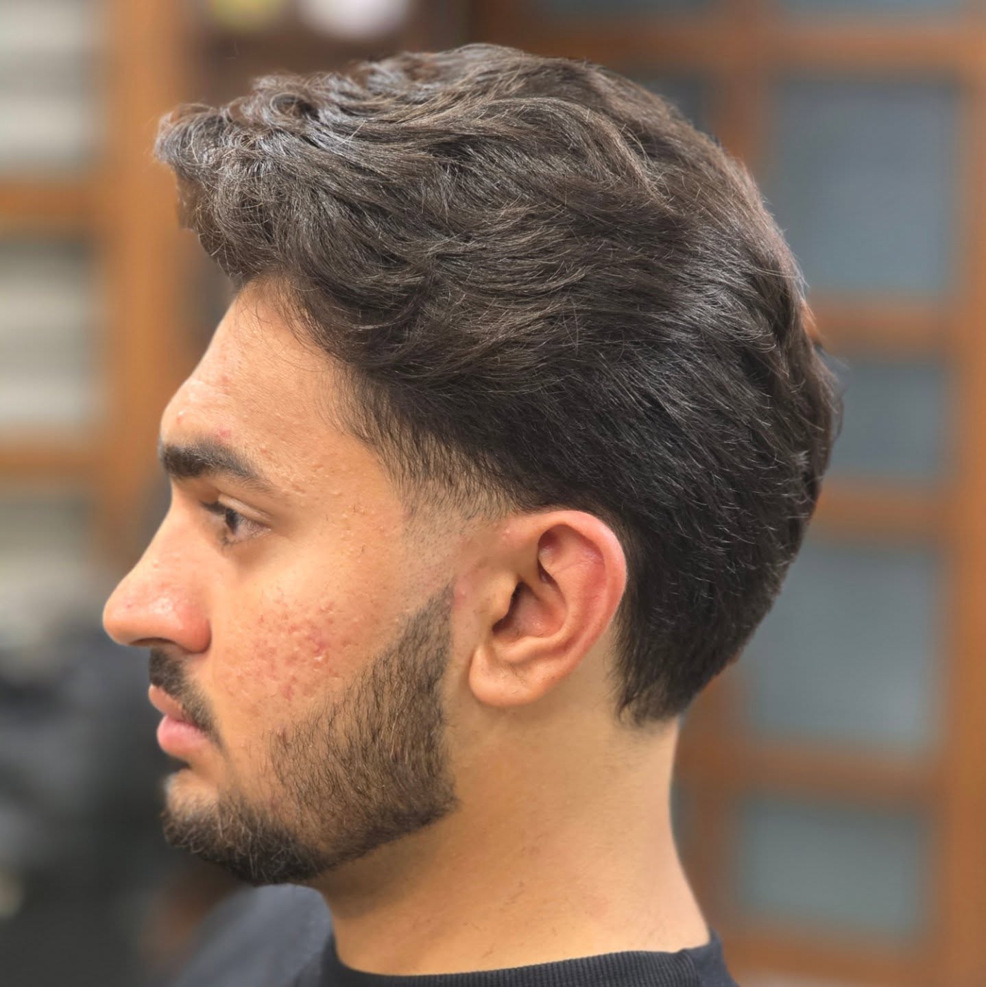 Modern Textured Side-Parted Cut with Tapered Sides