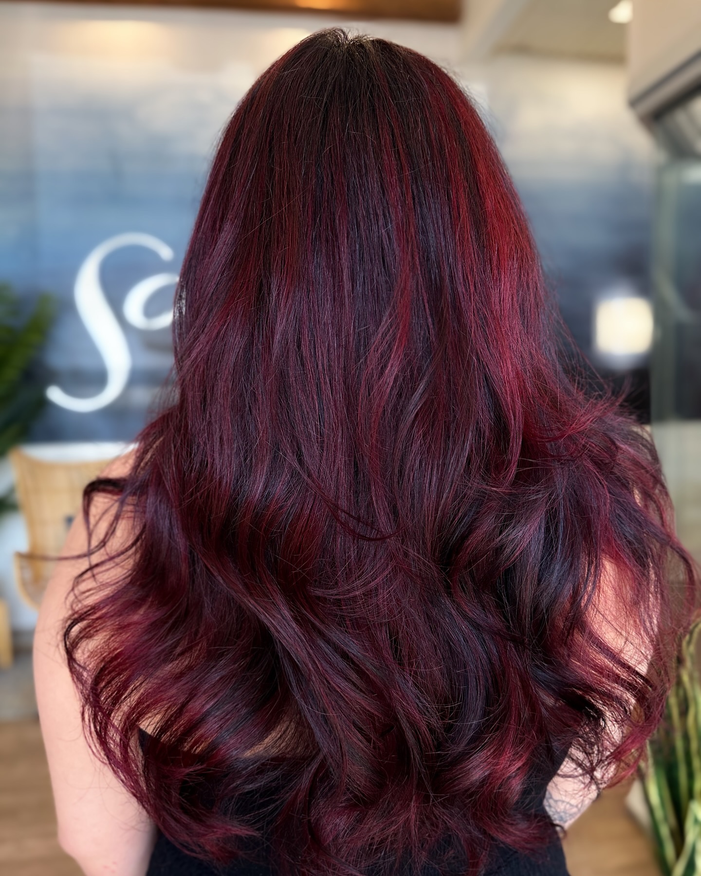 Radiant Black Cherry Balayage with Soft Layers