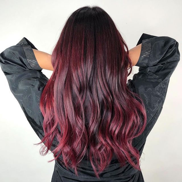 Radiant Black Cherry Balayage with Soft Textured Waves