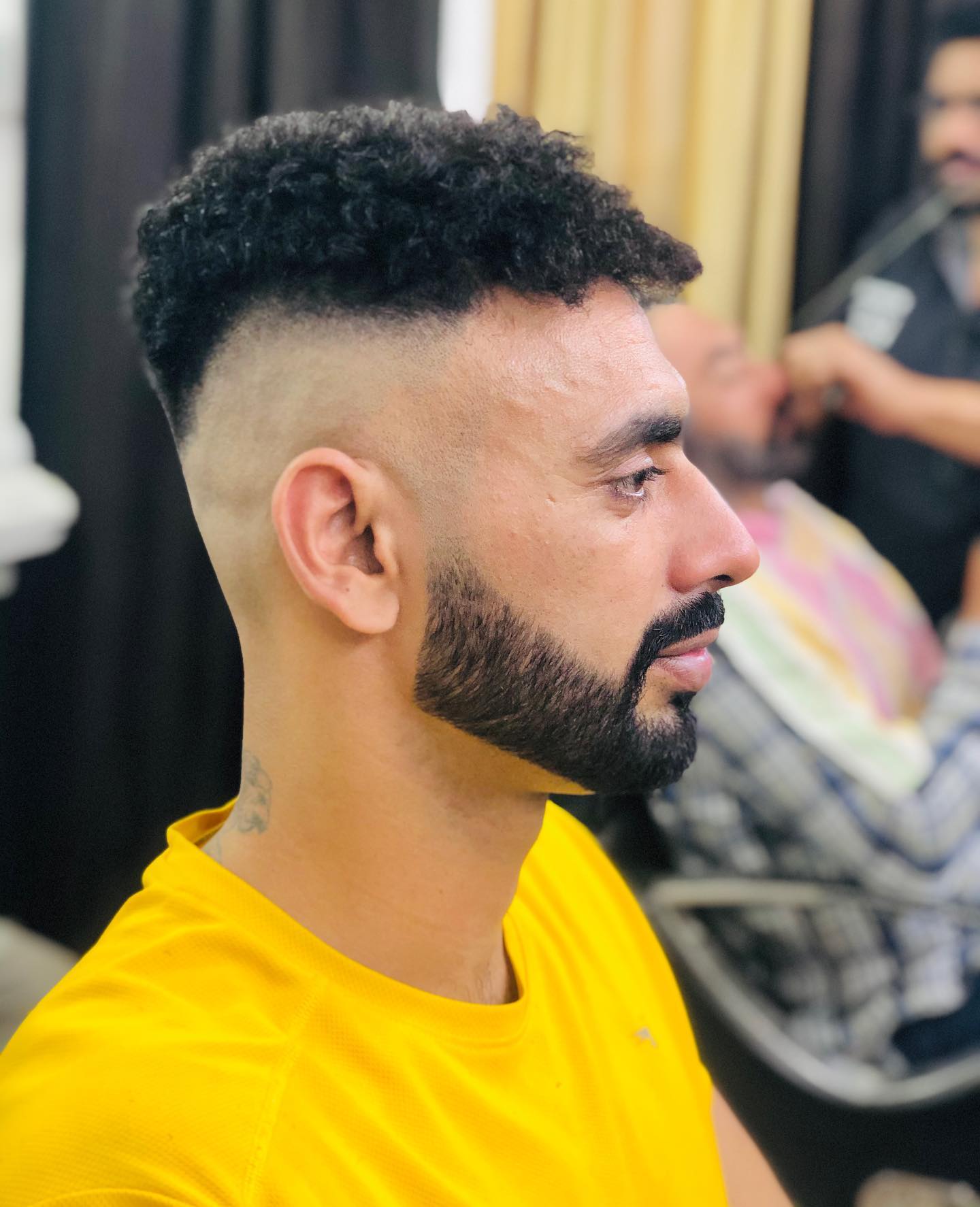 Textured Curly Top with Faded Sides