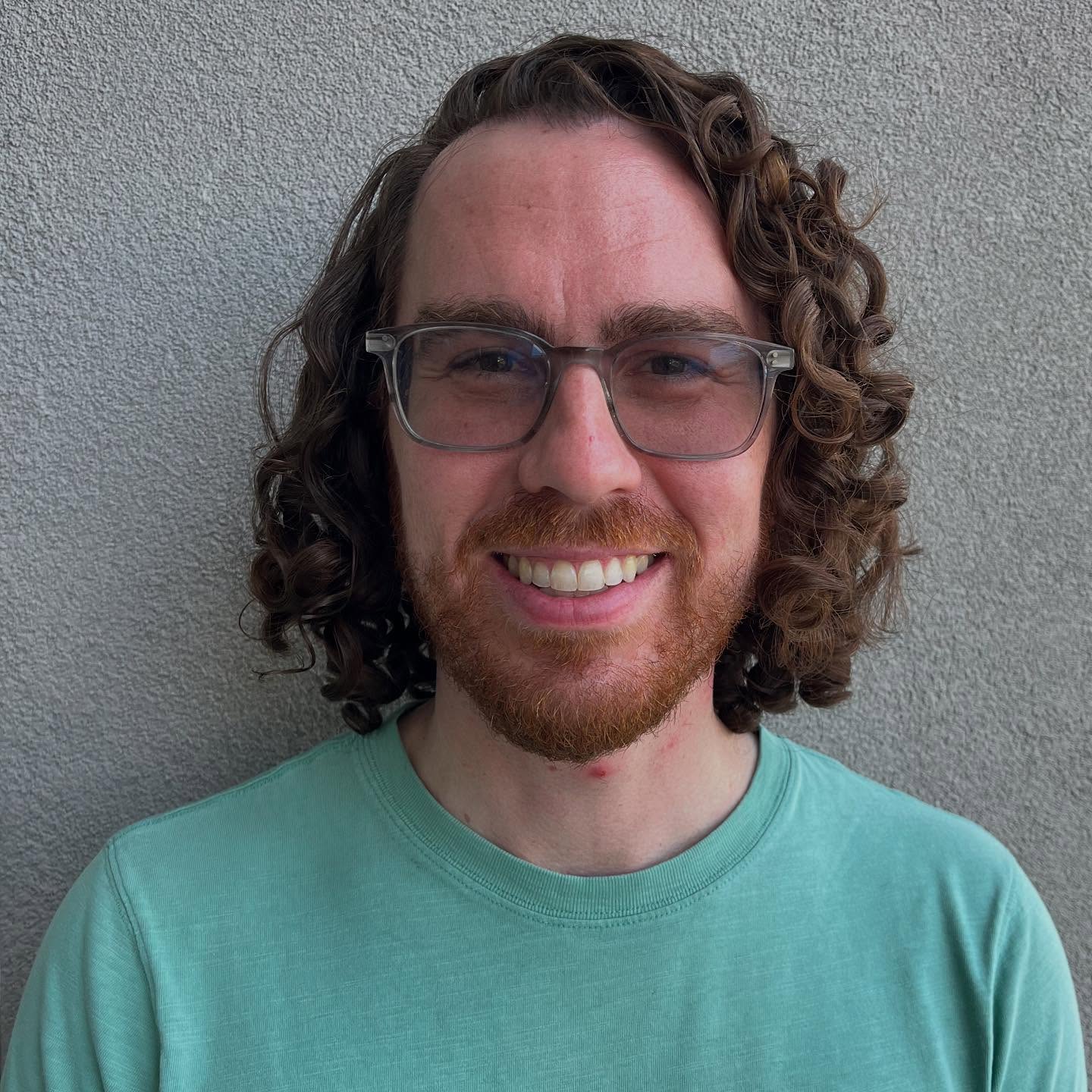 Textured Medium-Length Curly Cut with Defined Curls