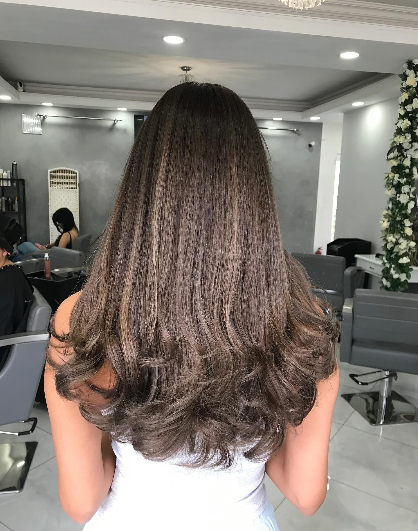 Elegant Ashy Brown Balayage with Soft Curls