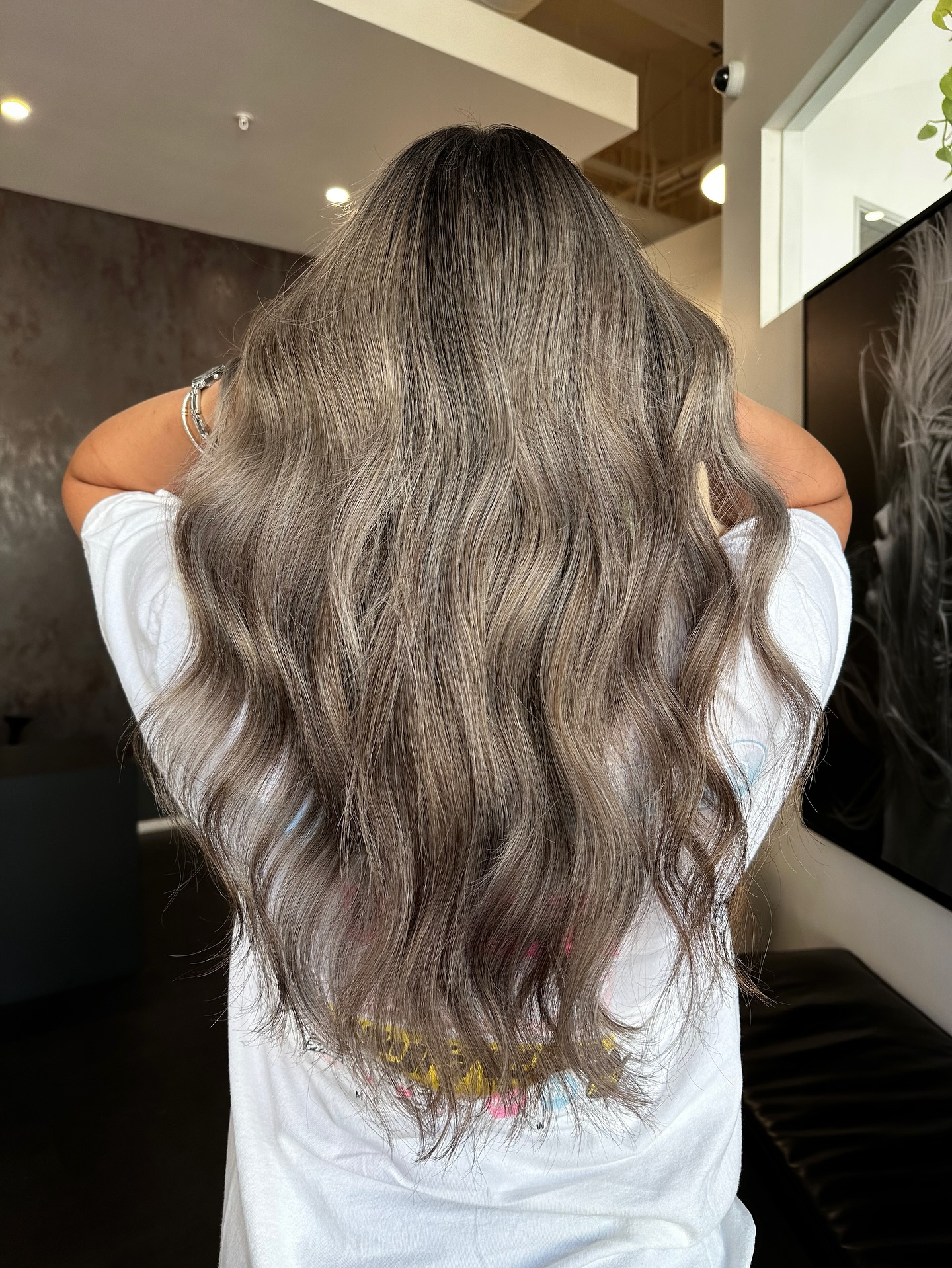 Stylish Long Ashy Brown Balayage with Soft Waves